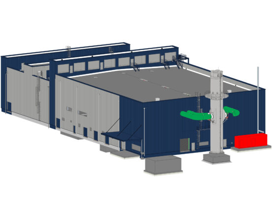 BHKW mit grünen Rohren und rotem Container im Vordergrund.