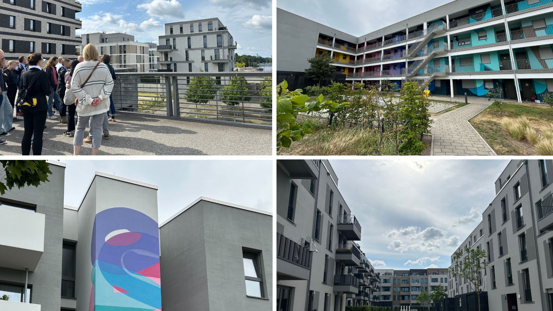 Moderne Wohnanlagen mit bunten Fassaden und ansprechenden Außenbereichen in urbaner Umgebung.