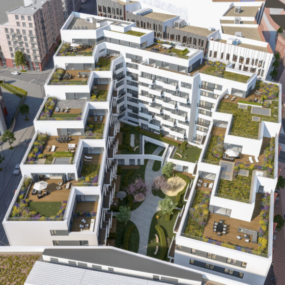 Moderne Wohnanlage mit begrünten Terrassen und Gemeinschaftsgarten in urbaner Umgebung.