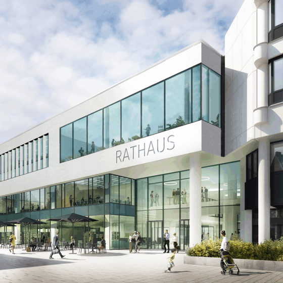 Visualisierung vom Rathaus Rheine mit Glasfassade und umgebenden Grünflächen in urbaner Umgebung.