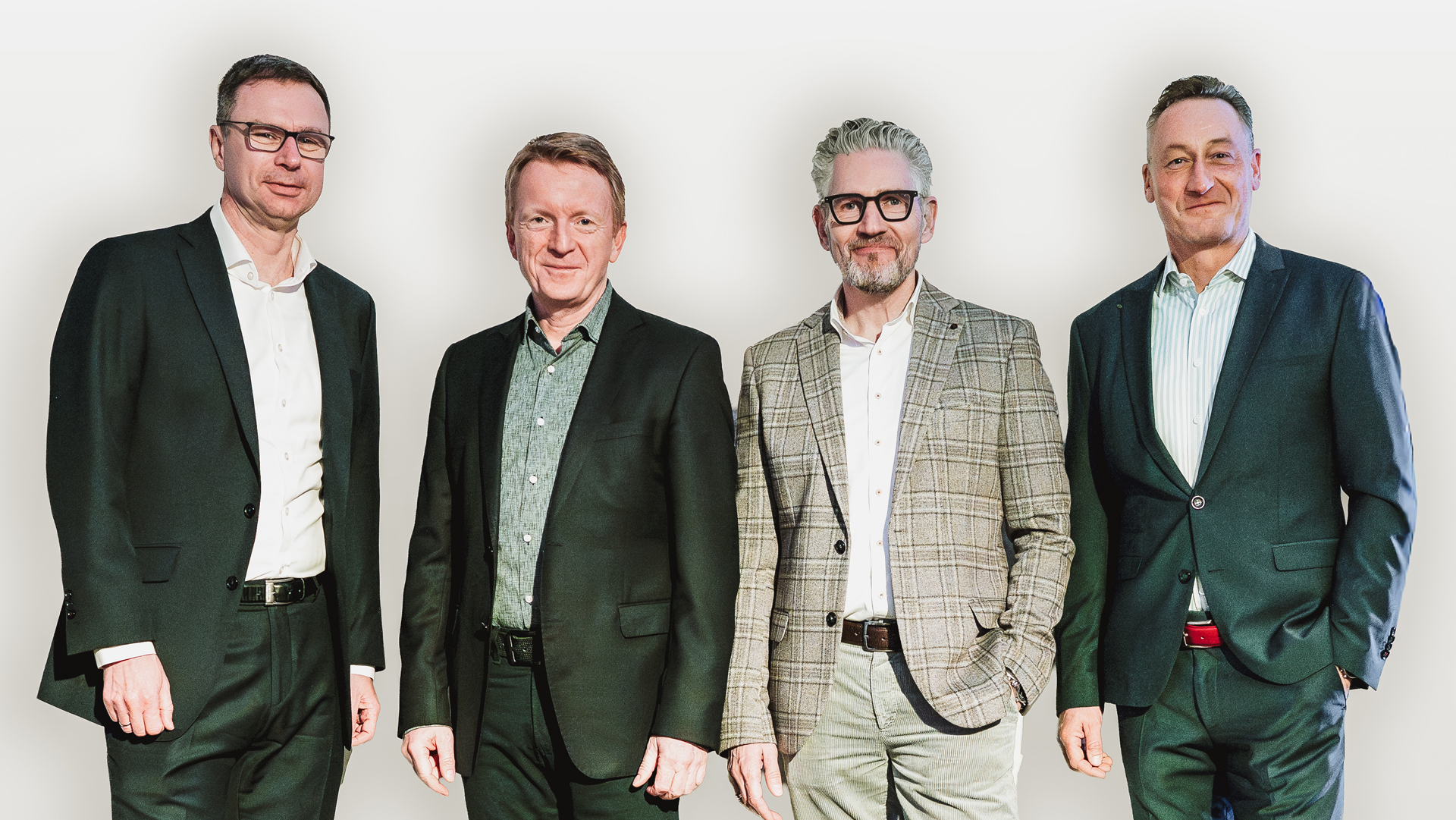 Foto der Geschäftsfüher von convis: Matthias Finck, Stephan Ludwig, Remus Grolle-Hüging, Jörg Walter.