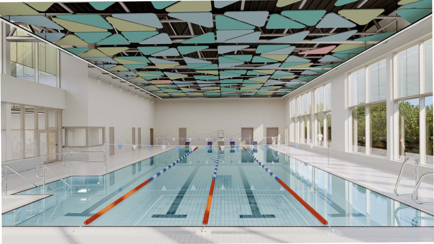 Moderne Schwimmhalle mit buntem Decken-Design und klaren Wasserbecken für sportliche Aktivitäten.